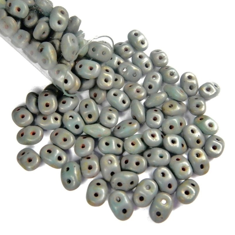 SUPERDUO, 2.5X5MM, TURQUOISE GREEN SNGL BRONZE/PURPLE MATTE. SOLD PER TUBE OF 10GM.